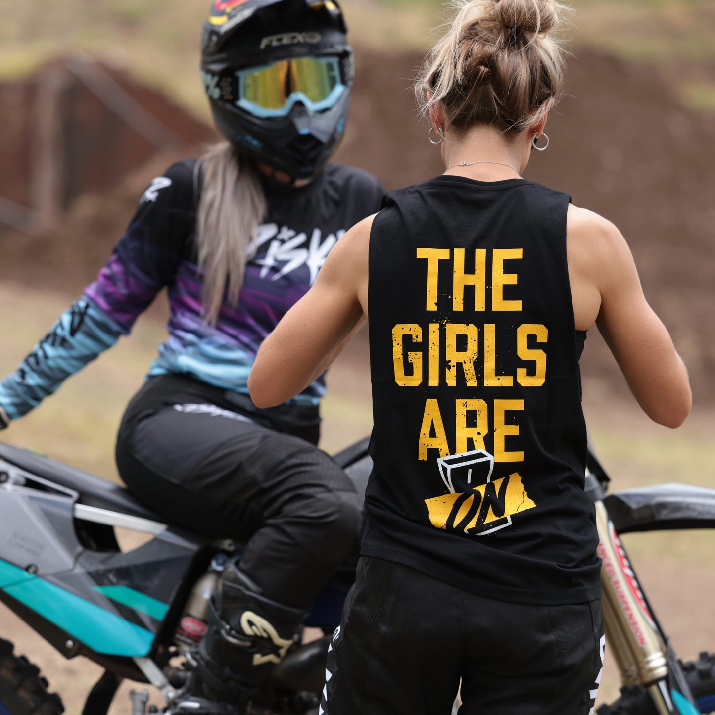 THE GIRLS ARE ON SINGLET